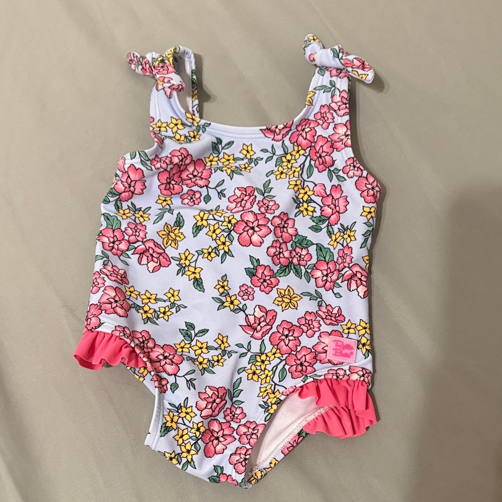 Ruffle Butts White Floral One-Piece Swimsuit with Pink and Yellow Flowers